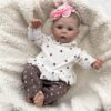 18-inch realistic newborn baby girl doll Mia with soft body, hand-painted features, and lifelike facial expression.
