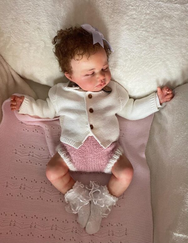 20-inch full silicone reborn baby girl doll Lily with soft skin, grafted hair, and realistic newborn features.