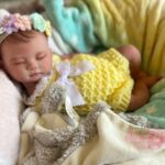 Full silicone reborn doll Charlotte posed peacefully