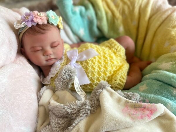 Full silicone reborn doll Charlotte posed peacefully