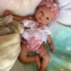 realistic silicone baby dolls Realistic full silicone reborn baby girl doll Isabella with soft skin, hand-painted details, and lifelike newborn expression.