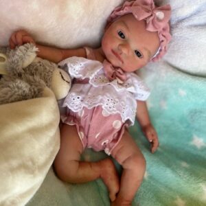 realistic silicone baby dolls Realistic full silicone reborn baby girl doll Isabella with soft skin, hand-painted details, and lifelike newborn expression.