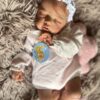 Full silicone reborn baby girl doll Penelope in a sleeping pose