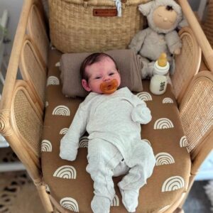 Close-up of hyper-realistic silicone baby boy Ismael showing detailed skin texture and hand-rooted lashes.