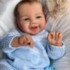 Lifelike vinyl reborn baby boy doll Grayson.