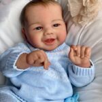 Lifelike vinyl reborn baby boy doll Grayson.